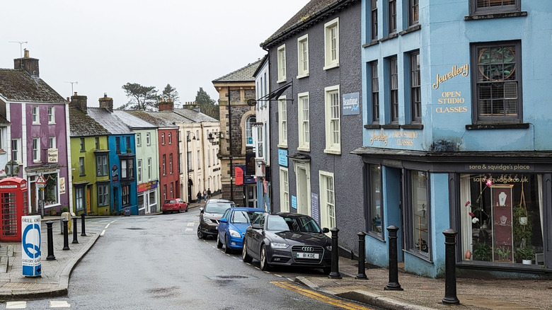 Colorful row houses line a curved street in Narberth, Wales
