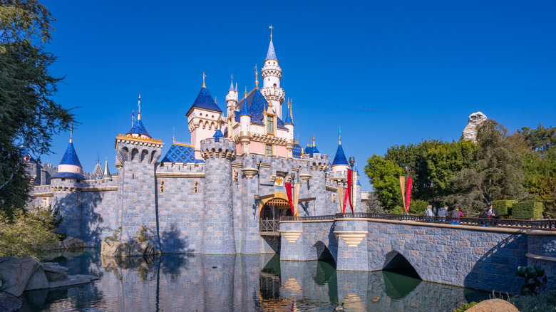 Sleeping Beauty Castle at Disneyland in Anaheim set against a blue sky