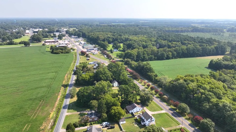 Aerial view of the downtown area of Exmore, Virginia, surrounded by green farmland