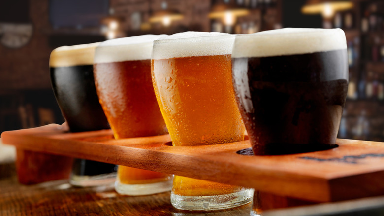Craft beer samples on a tasting tray