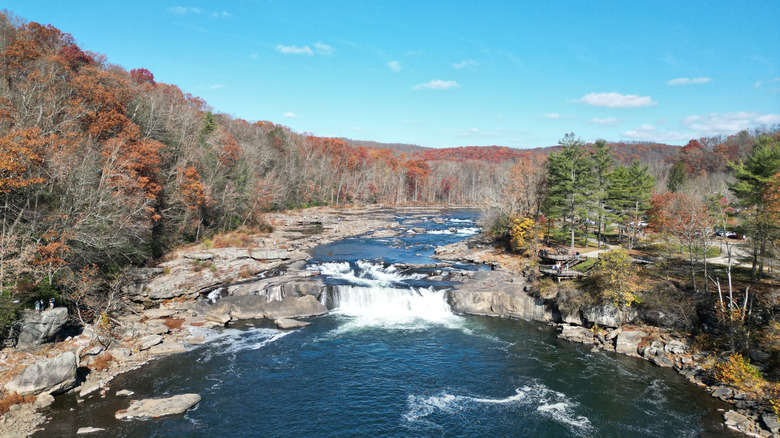 Landscape of Ohiopyle Falls surrounded by fall foliage