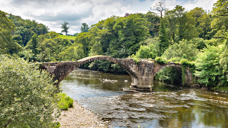 Old stone bridge across river