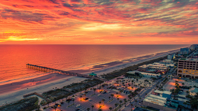 Aerial of Jacksonville Beach pier at sunset