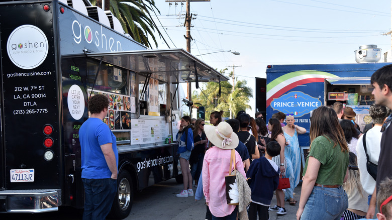 People waiting for their food on Abbot Kinney's First Fridays in Venice Beach, California