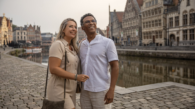 Happy couple exploring Ghent
