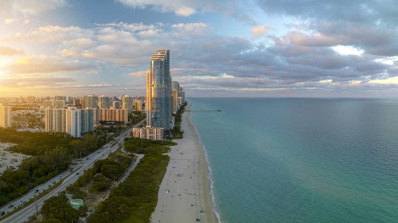 Sunny Isles Beach skyline, beach, and ocean at sunset