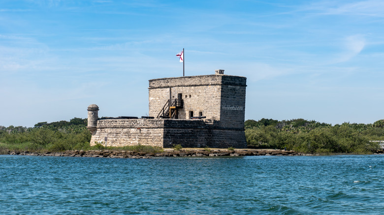 The Fort Matanzas National Monument and shore seen from the water