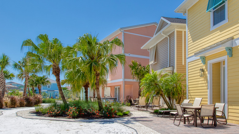 Colorful vacation homes and palm trees