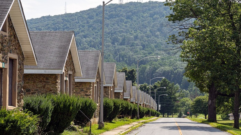 Stone barracks-style buildings backdropped by a mountain at Fort Ritchie, Maryland
