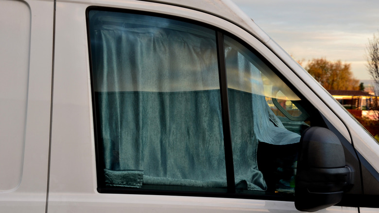 Curtains inside van window giving privacy