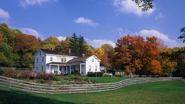 A view of the Inn at Brandywine Falls with fall foliage in Ohio