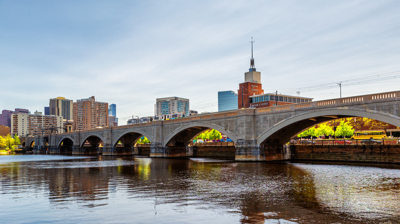 A Green Line subway train crossing over a bridge over the Charles River in Boston