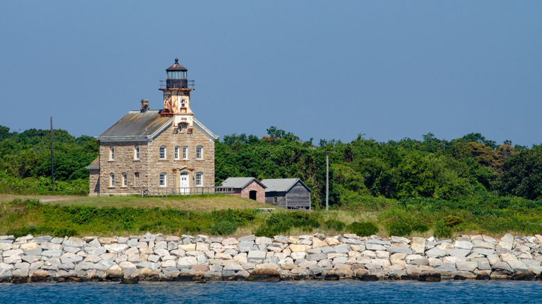 Plum Island lighthouse on rocky shore