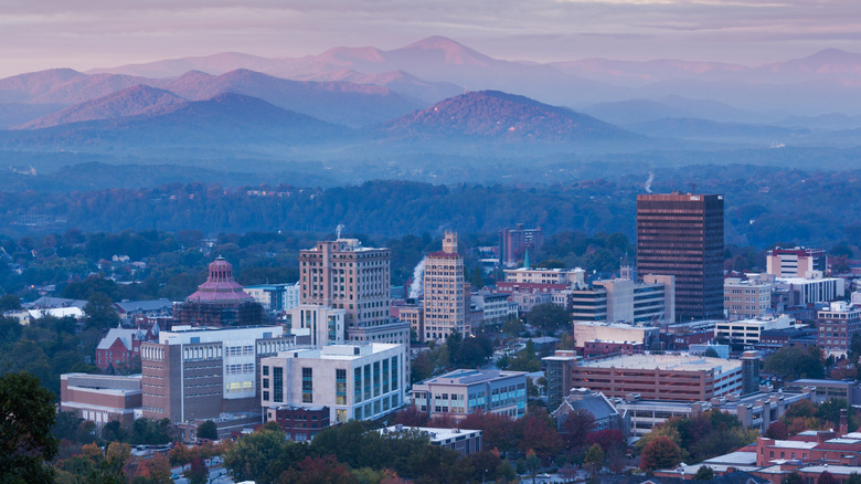 Aerial view of Asheville with Blue Ridge Mountains beyond