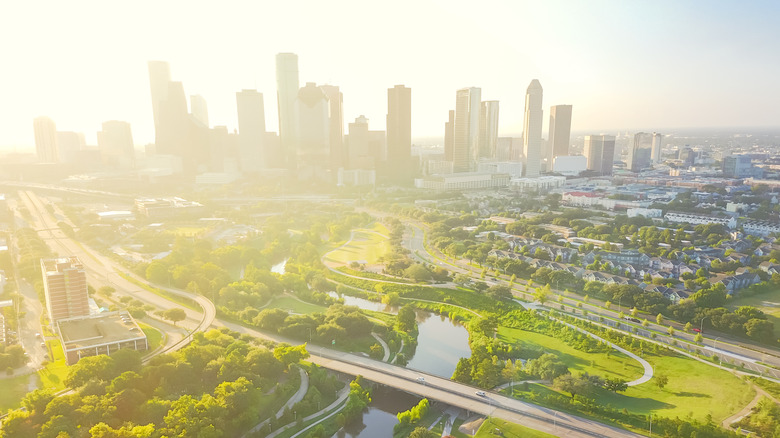 Aerial view of Fourth Ward with Houston skyline at sunrise