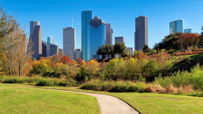 Pathway with buildings in Eleanor Tinsley Park in Houston