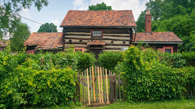 A building surrounded by hedges in the Historic Zoar Village in Ohio