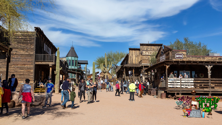 Tourists exploring Goldfield Ghost Town by day