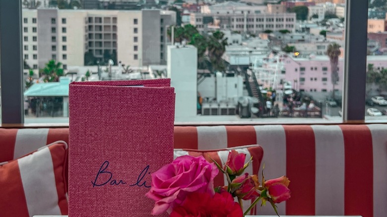 Menu of the trendy Bar Lis with Hollywood window view in background