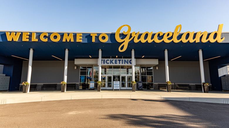 Welcome to Graceland sign and ticket office blue sky