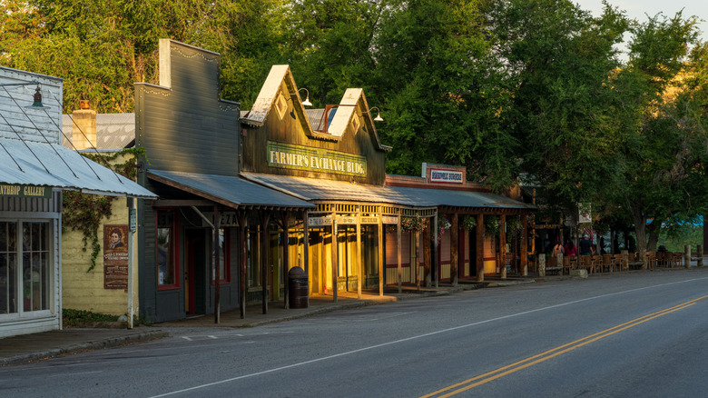 Old Wild West style buildings line a street in Winthrop, WA