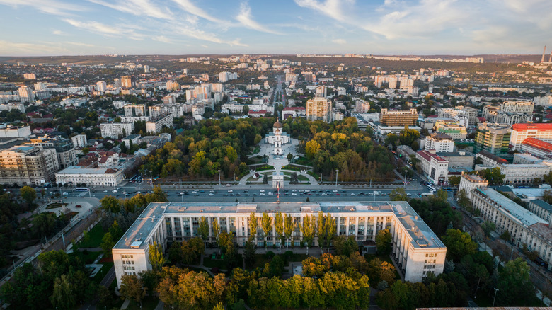 Aerial drone view of Chisinau downtown at sunset, Moldova. View of Central Park, Cathedral, Goverment and a lot of greenery