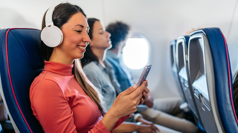 Woman sitting on an airplane