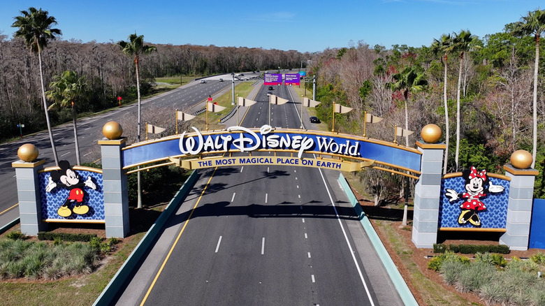 Aerial view of Walt Disney World welcome sign over the highway in Orlando, Florida