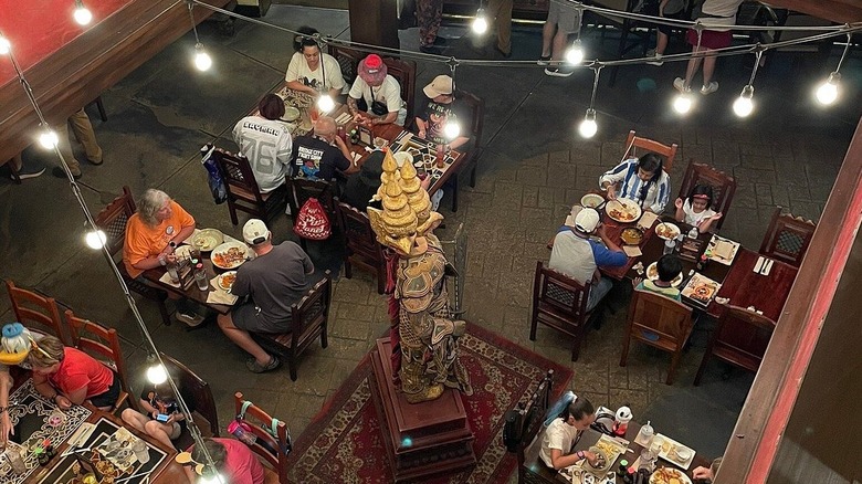 Aerial view of guests enjoying their meals at Yak & Yeti, a Nepalese-style restaurant at Animal Kingdom theme park in Walt Disney World Resort in Orlando, Florida