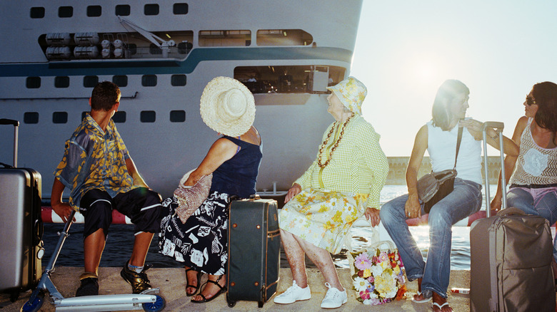 Passengers waiting to embark on a cruise ship