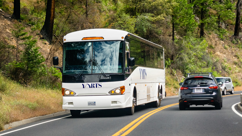 A Yosemite Area Regional Transportation System (YARTS) bus drive on a mountain road.