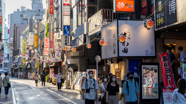 People walking through Kichijoji's streets in Japan