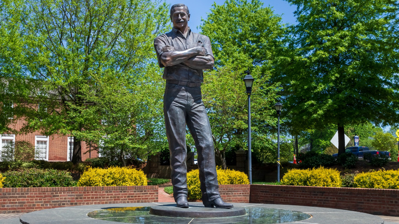 Dale Earnhardt Tribute Plaza in Kannapolis, NC, surrounded by trees.