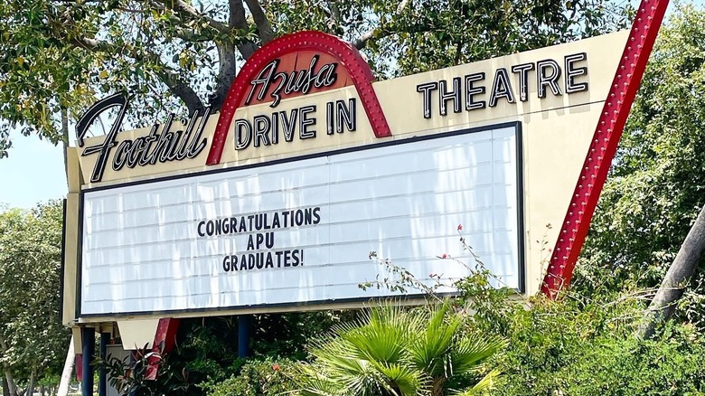 Azusa Foothill Drive In Theatre neon sign with announcement