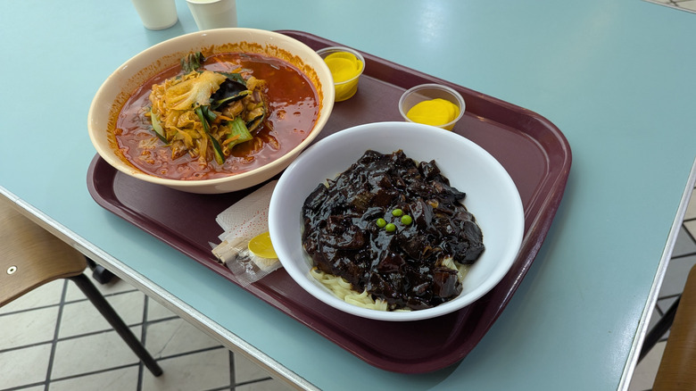 jjamppong seafood stew and jjajangmyeon noodles served on a tray at the Koreatown Plaza food court