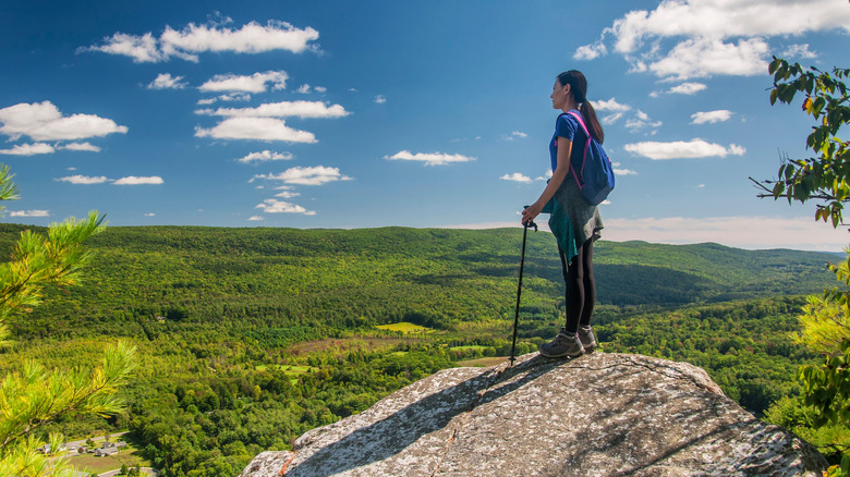 A woman hiking mountains and hills around Great Barrington, Massachusetts