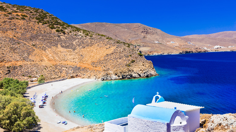 Mountains above a beach and church in Astypalaia, Greece