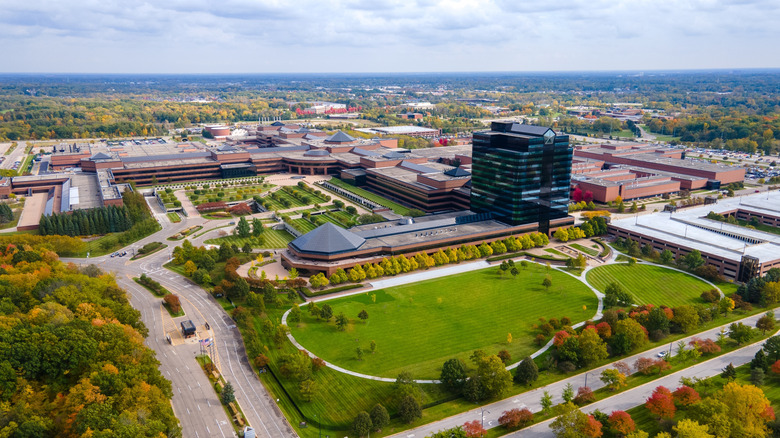 An aerial photo of some corporate buildings in Auburn Hills with a nice park in the foreground and trees stretching to the horizon