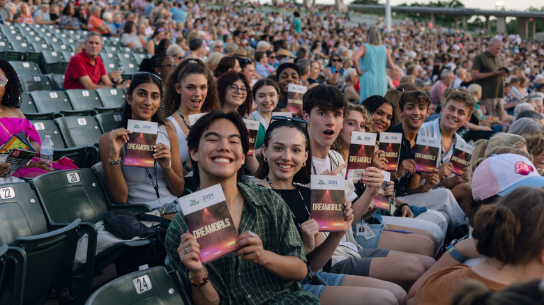 A group of young patrons attends a production of "Dreamgirls" at The Muny in St. Louis, Missouri.