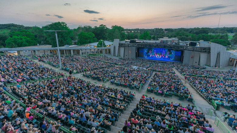 Audiences watch a performance live at The Muny in Forest Park, the largest outdoor theater located in St. Louis, Missouri.