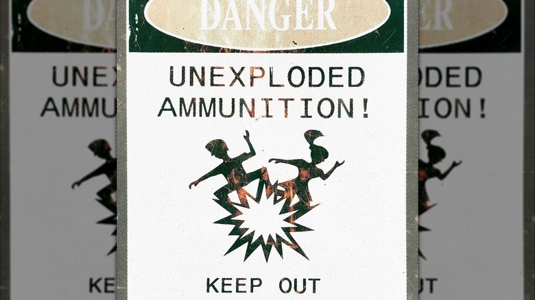 Poster warning about unexploded ammunition