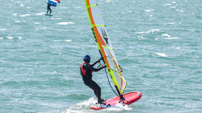 Windsurfers on the water at Buffalo Harbor State Park