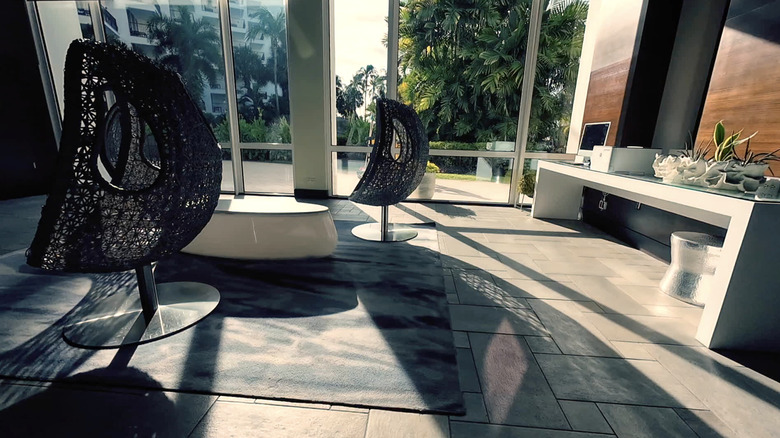 Woven basket chairs stand in the Aruba Marriott lobby
