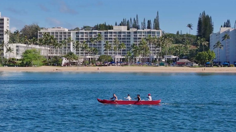 Outrigger canoeing in bay in front of Royal Sonesta Resort Kaua'i