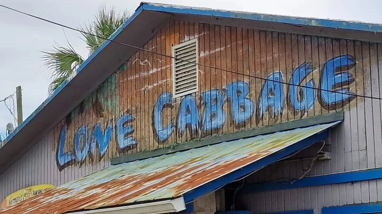 Lone Cabbage painted on side of building