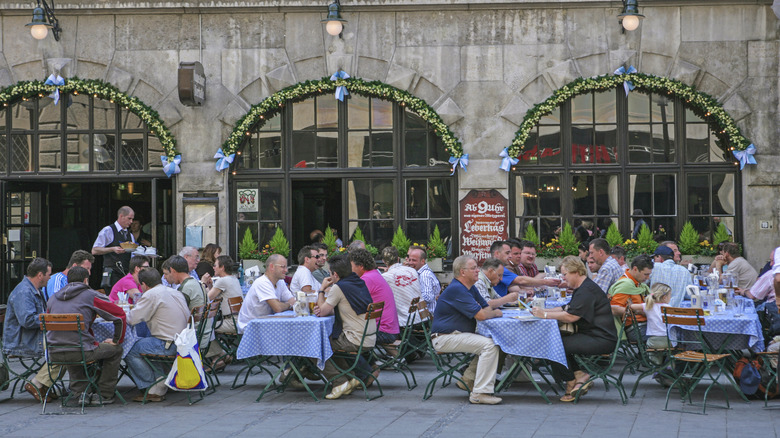 Busy patio at Augustiner Bräu restaurant in Munich