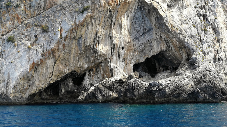 The outside of sea caves at Dino Island, Italy