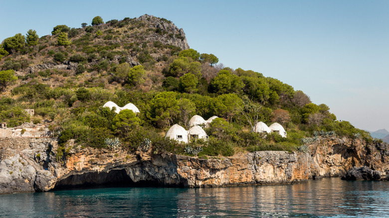 View of the landscape and abandoned bungalows on Dino Island, Italy