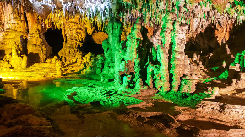 The inside of Florida Caverns State Park lit up green