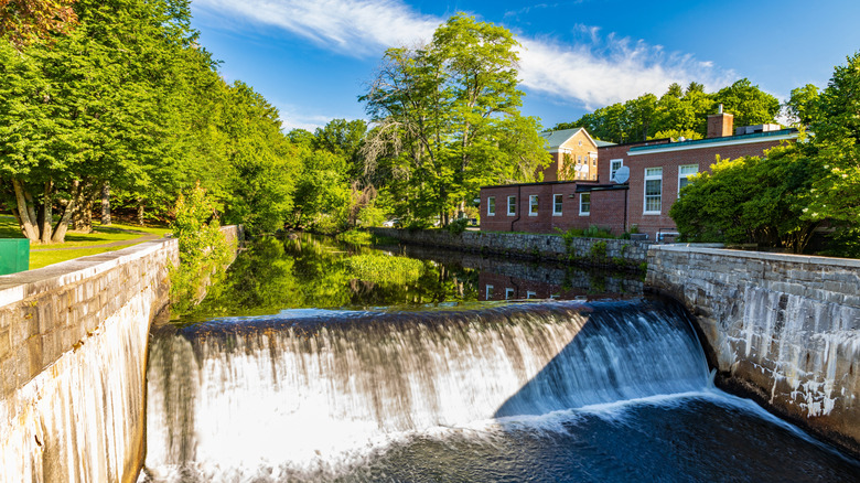Water rushes over dam in Lamprey River, Newmarket, NH
